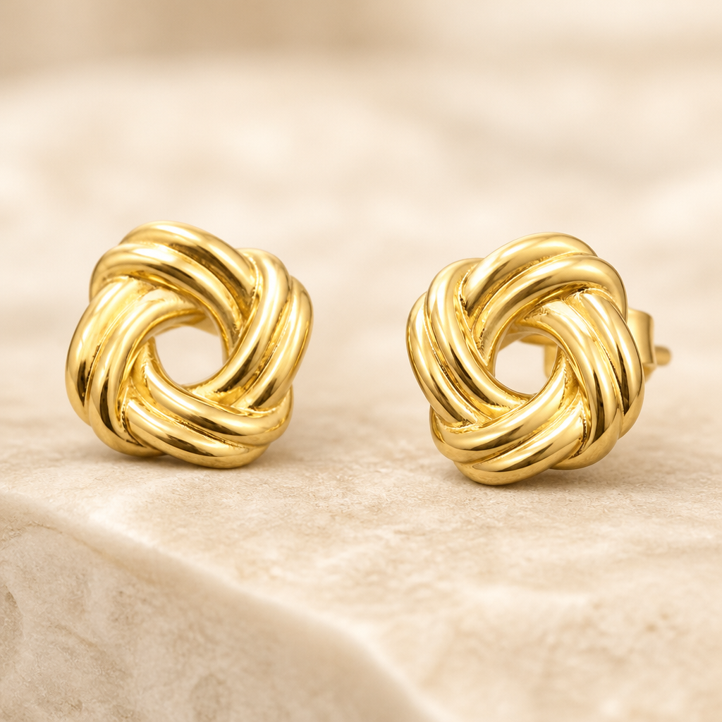 Aretes omega de oro 10k con diseño de nudo