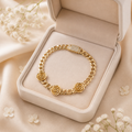 Pulsera de oro amarillo de 10K con diseño de rosas.
